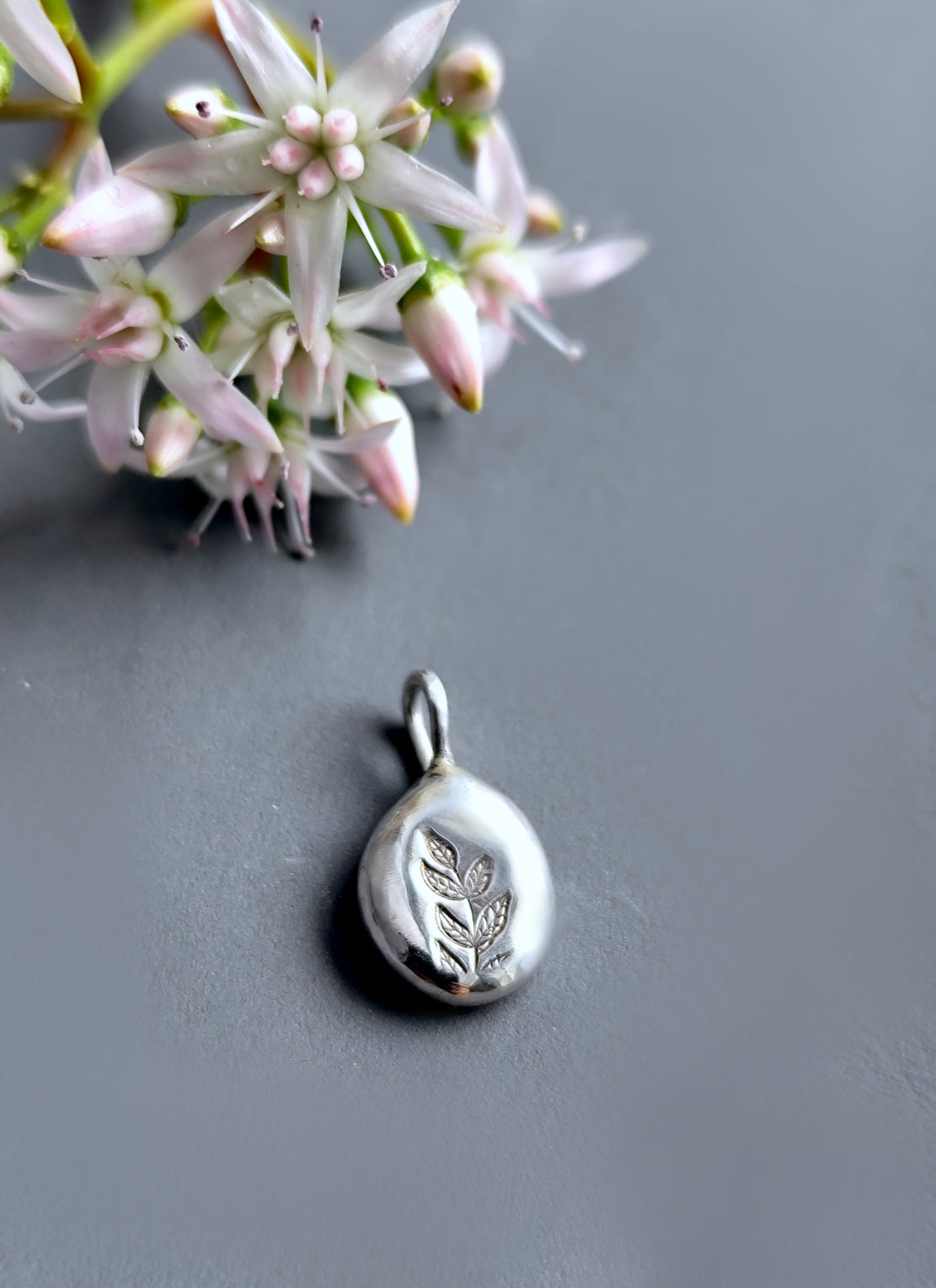 Dainty Organic Silver Drop Pendant with Leafy Detail